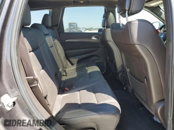 2014 Jeep Grand Cherokee Summit with VIN 1C4RJFJGXEC159438, listed as a Copart auction lot 50864595 with 134,558 mi miles and Salvage title. Bid and sale history available at DreamBid. Image 11.