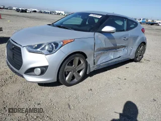 2013 Hyundai Veloster Turbo z VIN KMHTC6AE2DU174289, wystawiony jako Copart lot #57849255 z przebiegiem 150 604 mil mil oraz Szkody całkowita. Historia ofert i sprzedaży dostępna na DreamBid. Obrazek 1.