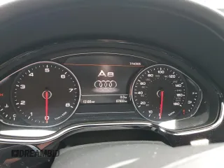 2014 Audi A8 4.0T with VIN WAUR2AFD5EN003923, listed as a Copart auction lot 65389025 with 97,833 mi miles and Salvage title. Bid and sale history available at DreamBid. Image 9.