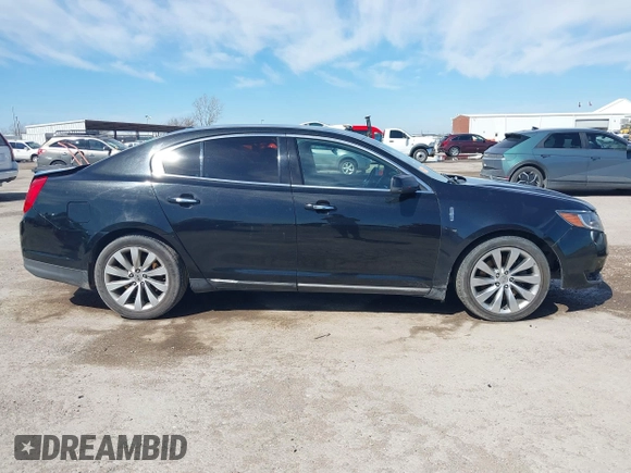 2014 Lincoln MKS with VIN 1LNHL9DK1EG604323, listed as a IAAI auction lot 41635817 with 223,136 mi miles. Bid and sale history available at carsss.com. Image 13.