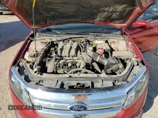 2012 Ford Fusion SEL z VIN 3FAHP0JG8CR435577, wystawiony jako Copart lot #79741724 z przebiegiem 145 023 mil mil oraz Szkoda całkowita • Salvage title. Historia ofert i sprzedaży dostępna na DreamBid. Obrazek 11.