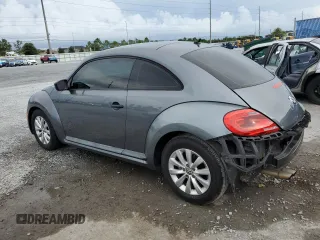 2014 Volkswagen Beetle Entry z VIN 3VWF17AT2EM642942, wystawiony jako Copart lot #60241445 z przebiegiem 70 780 mil mil oraz Szkoda całkowita • Salvage title. Historia ofert i sprzedaży dostępna na DreamBid. Obrazek 2.