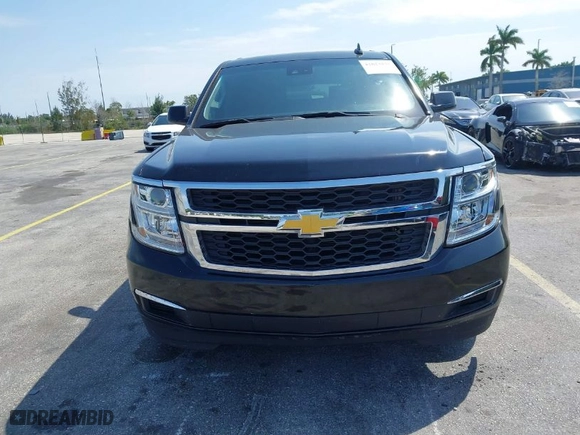 2018 Chevrolet Suburban LT with VIN 1GNSCHKC7JR111560, listed as a IAAI auction lot 41823175 with 136,751 mi miles. Bid and sale history available at carsss.com. Image 12.