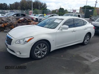 2014 Infiniti Q70 Luxe z VIN JN1BY1AP3EM260169, wystawiony jako IAAI lot #42128494 z przebiegiem 97 189 mil mil oraz . Historia ofert i sprzedaży dostępna na DreamBid. Obrazek 2.