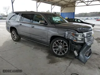 2018 Chevrolet Suburban Premier with VIN 1GNSCJKC1JR203318, listed as a Copart auction lot 44690745 with 120,137 mi miles and Salvage Title. Bid and sale history available at carsss.com. Image 4.
