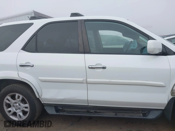 2004 Acura MDX Touring Pkg w/Navigation with VIN 2HNYD18874H545924, listed as a IAAI auction lot 41080740 with 343,574 mi miles. Bid and sale history available at carsss.com. Image 13.