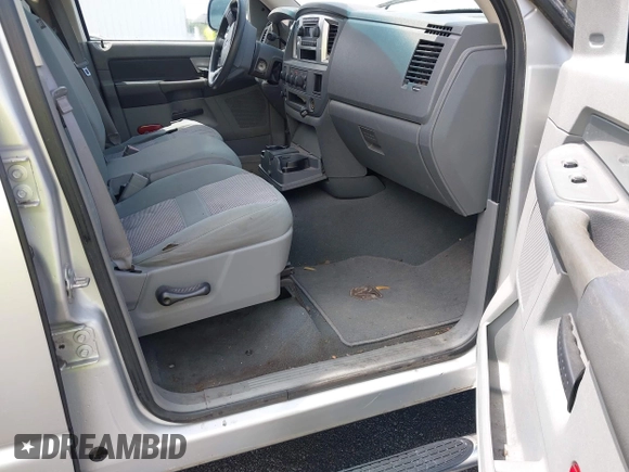 2007 Dodge 1500 SLT with VIN 1D7HU18257S191518, listed as a IAAI auction lot 42108231 with 163,756 mi miles. Bid and sale history available at carsss.com. Image 5.