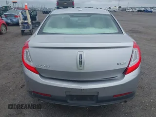 2013 Lincoln MKS с VIN 1LNHL9DK3DG604712, выставлен на аукционе IAAI как лот 42351237 с пробегом 144 927 миль миль и . История ставок и продаж доступна на DreamBid. Изображение 14.