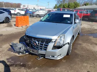 2013 Cadillac CTS Premium with VIN 1G6DP5E39D0100975, listed as a IAAI auction lot 41915113 with 110,436 mi miles and . Bid and sale history available at DreamBid. Image 16.