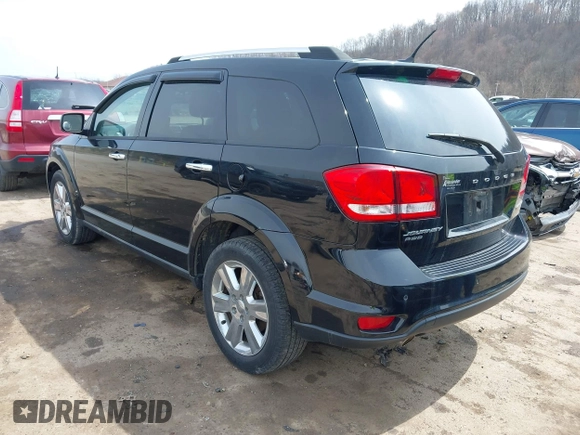 2014 Dodge Journey Limited with VIN 3C4PDDDG8ET150059, listed as a IAAI auction lot 41915239 with 120,897 mi miles and . Bid and sale history available at carsss.com. Image 3.