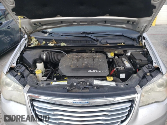 2011 Chrysler Town & Country Limited with VIN 2A4RR6DGXBR698448, listed as a Copart auction lot 70932134 with 130,140 mi miles and Salvage Title. Bid and sale history available at DreamBid. Image 12.
