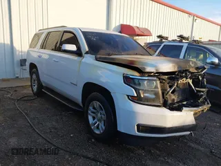 2015 Chevrolet Tahoe LS z VIN 1GNSCAKC0FR265087, wystawiony jako IAAI lot #41271178 z przebiegiem Nie podano mil oraz . Historia ofert i sprzedaży dostępna na DreamBid. Obrazek 1.