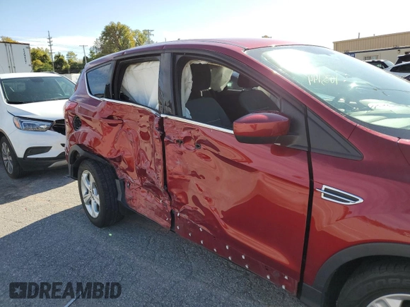 2015 Ford Escape SE with VIN 1FMCU0GX6FUA78428, listed as a Copart auction lot 63055212 with 103,144 mi miles and Salvage Title. Bid and sale history available at carsss.com. Image 9.