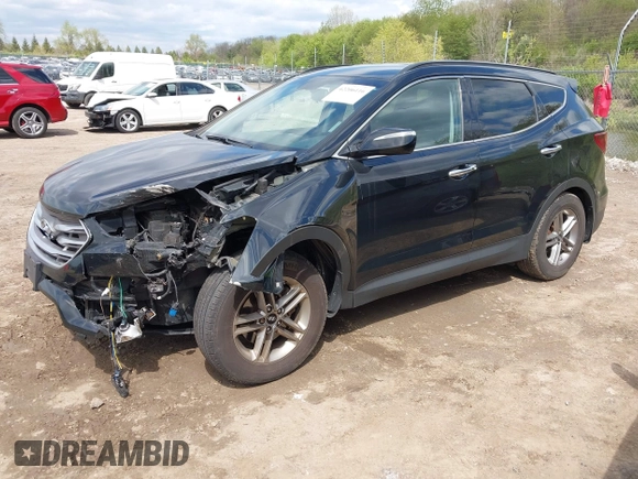 2018 Hyundai Santa Fe 2.4L z VIN 5NMZUDLB2JH058032, wystawiony jako IAAI lot #42206116 z przebiegiem 138 688 mil mil oraz . Historia ofert i sprzedaży dostępna na DreamBid. Obrazek 18.
