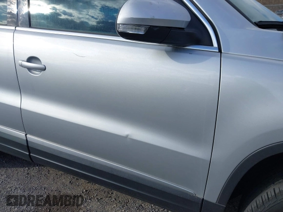 2012 Volkswagen Tiguan SE with VIN WVGAV7AX2CW543003, listed as a IAAI auction lot 41803970 with 187,639 mi miles and . Bid and sale history available at DreamBid. Image 14.