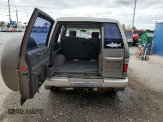 2001 Isuzu Trooper S z VIN JACDS58X617J03960, wystawiony jako Copart lot #86744174 z przebiegiem 78 078 mil mil oraz Nie do naprawy • Non repairable. Historia ofert i sprzedaży dostępna na DreamBid. Obrazek 6.