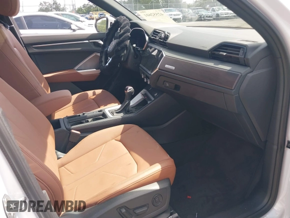 2024 Audi Q3 S line Premium Plus with VIN WA1EECF3XR1042154, listed as a IAAI auction lot 42552601 with 22,881 mi miles and . Bid and sale history available at DreamBid. Image 5.