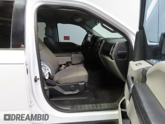 2015 Ford F-150 XL with VIN 1FTEW1CG0FKD61342, listed as a Copart auction lot 60142545 with 113,798 mi miles and Salvage title. Bid and sale history available at DreamBid. Image 5.