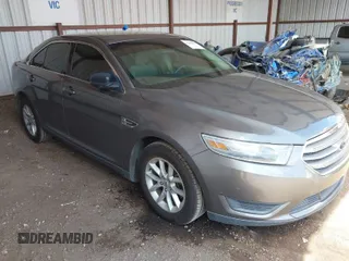 2014 Ford Taurus SE with VIN 1FAHP2D89EG136335, listed as a IAAI auction lot 41880655 with 211,635 mi miles. Bid and sale history available at carsss.com. Image 1.