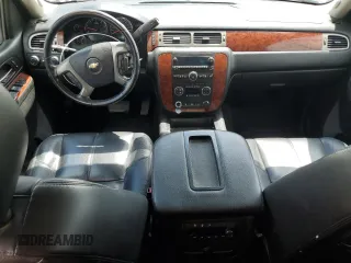 2014 Chevrolet Suburban LT with VIN 1GNSKJE77ER193143, listed as a Copart auction lot 54311935 with 171,407 mi miles and Salvage Title. Bid and sale history available at DreamBid. Image 8.