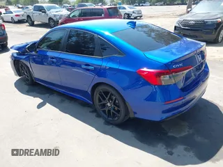 2023 Honda Civic Sedan Sport with VIN 2HGFE2F55PH524584, listed as a IAAI auction lot 41969609 with 66,313 mi miles. Bid and sale history available at carsss.com. Image 3.
