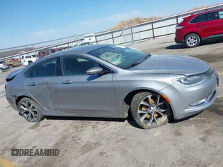2015 Chrysler 200 C with VIN 1C3CCCCG0FN509701, listed as a IAAI auction lot 41873084 with Not Provided miles and . Bid and sale history available at carsss.com. Image 13.