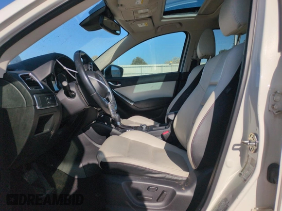 2016 Mazda CX-5 Grand Touring with VIN JM3KE4DY8G0671256, listed as a Copart auction lot 52920975 with 87,822 mi miles and Non Repairable. Bid and sale history available at carsss.com. Image 7.
