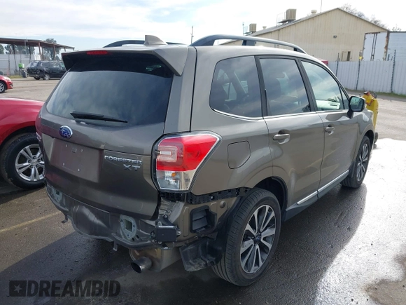 2017 Subaru Forester Touring with VIN JF2SJGWC8HH802262, listed as a IAAI auction lot 41681997 with 75,993 mi miles. Bid and sale history available at carsss.com. Image 4.