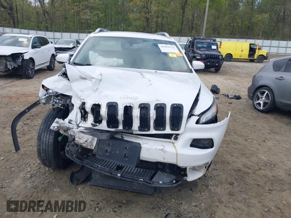 2016 Jeep Cherokee Latitude with VIN 1C4PJMCS5GW148829, listed as a IAAI auction lot 41964335 with 99,741 mi miles. Bid and sale history available at carsss.com. Image 12.