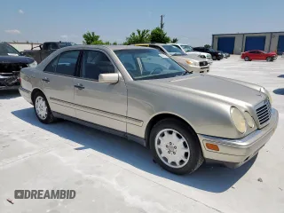 1999 Mercedes-Benz E 320 z VIN WDBJF65H4XA790071, wystawiony jako Copart lot #58670245 z przebiegiem 285 571 mil mil oraz Czysty tytuł • Clean title. Historia ofert i sprzedaży dostępna na DreamBid. Obrazek 4.