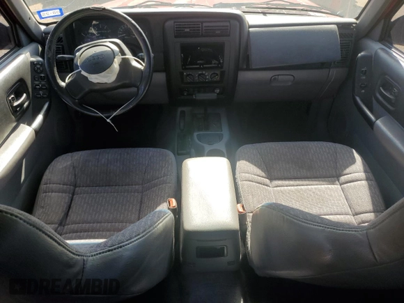 1998 Jeep Cherokee Sport with VIN 1J4FJ68S3WL167809, listed as a Copart auction lot 53829645 with Not provided miles and Salvage title. Bid and sale history available at DreamBid. Image 8.