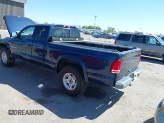 2001 Dodge Dakota Sport z VIN 1B7GG22N21S276507, wystawiony jako IAAI lot #42072844 z przebiegiem 225 874 mil mil oraz . Historia ofert i sprzedaży dostępna na DreamBid. Obrazek 3.
