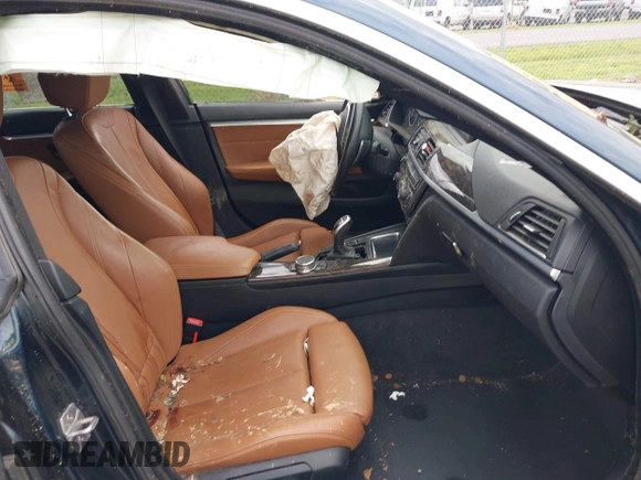 2016 BMW 4 Series 428i with VIN WBA4A9C52GGL88003, listed as a IAAI auction lot 42225642 with 105,054 mi miles and . Bid and sale history available at DreamBid. Image 5.