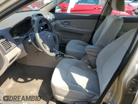 2009 Kia Spectra EX with VIN KNAFE222395665848, listed as a Copart auction lot 51017925 with 30,186 mi miles and Salvage Title. Bid and sale history available at DreamBid. Image 7.