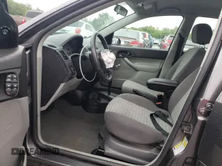 2007 Ford Focus S z VIN 1FAHP34N07W177912, wystawiony jako Copart lot #60481025 z przebiegiem 114 086 mil mil oraz Szkoda całkowita • Salvage title. Historia ofert i sprzedaży dostępna na DreamBid. Obrazek 7.