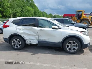 2018 Honda CR-V EX-L z VIN 2HKRW2H86JH682270, wystawiony jako IAAI lot #42182149 z przebiegiem 72 680 mil mil oraz . Historia ofert i sprzedaży dostępna na DreamBid. Obrazek 13.