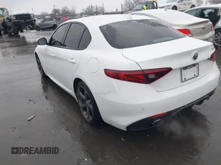 2017 Alfa Romeo Giulia with VIN ZARFAEBN5H7540188, listed as a IAAI auction lot 41619098 with 106,512 mi miles. Bid and sale history available at carsss.com. Image 3.
