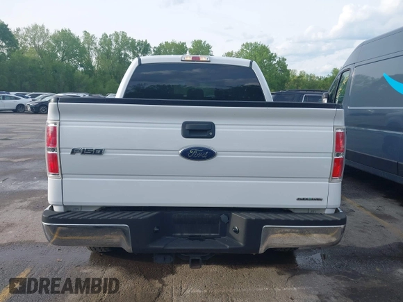 2014 Ford F-150 XL with VIN 1FTFW1EFXEKE92754, listed as a IAAI auction lot 42109551 with 219,130 mi miles. Bid and sale history available at carsss.com. Image 17.