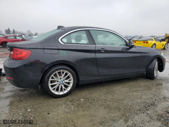 2014 BMW 2 Series 228i with VIN WBA1F5C51EVV99277, listed as a Copart auction lot 87306954 with 73,211 mi miles and Salvage Title. Bid and sale history available at carsss.com. Image 3.