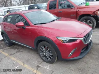 2018 Mazda CX-3 Grand Touring with VIN JM1DKFD75J0305565, listed as a IAAI auction lot 41135957 with 26,810 mi miles. Bid and sale history available at carsss.com. Image 1.