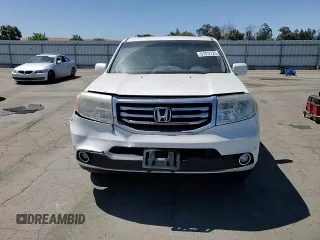 2013 Honda Pilot Touring with VIN 5FNYF4H95DB016049, listed as a Copart auction lot 61012725 with 104,252 mi miles and Salvage title. Bid and sale history available at DreamBid. Image 14.