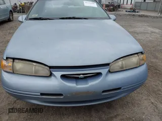 1997 Ford Thunderbird LX with VIN 1FALP62W2VH105702, listed as a IAAI auction lot 41713980 with 90,775 mi miles and . Bid and sale history available at DreamBid. Image 10.