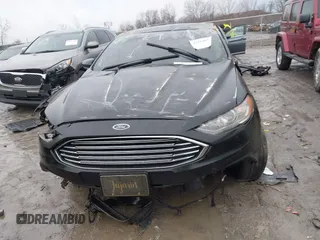 2017 Ford Fusion SE z VIN 3FA6P0H7XHR404013, wystawiony jako IAAI lot #41664822 z przebiegiem Nie podano mil oraz . Historia ofert i sprzedaży dostępna na DreamBid. Obrazek 12.