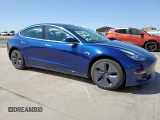 2020 Tesla Model 3 Long Range with VIN 5YJ3E1EB6LF617634, listed as a Copart auction lot 87010814 with 72,916 mi miles and Salvage Title. Bid and sale history available at carsss.com. Image 4.
