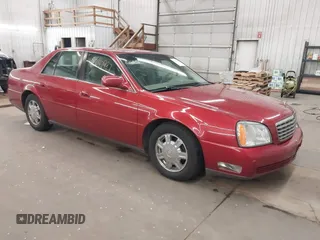2005 Cadillac DeVille z VIN 1G6KD57Y85U107418, wystawiony jako IAAI lot #42352987 z przebiegiem 160 974 mil mil oraz . Historia ofert i sprzedaży dostępna na DreamBid. Obrazek 1.