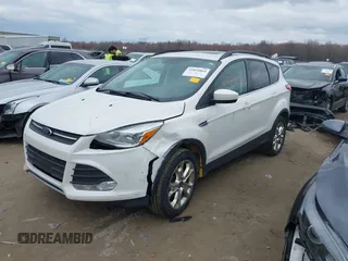 2016 Ford Escape SE with VIN 1FMCU9G94GUB55448, listed as a IAAI auction lot 41854864 with 153,457 mi miles. Bid and sale history available at carsss.com. Image 17.