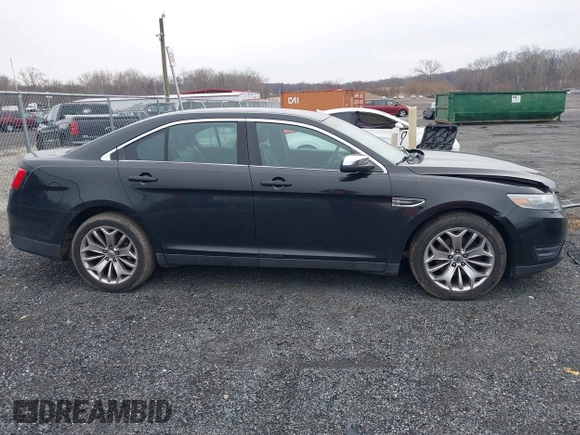 2014 Ford Taurus Limited with VIN 1FAHP2F81EG113984, listed as a IAAI auction lot 41542792 with 213,206 mi miles. Bid and sale history available at carsss.com. Image 14.
