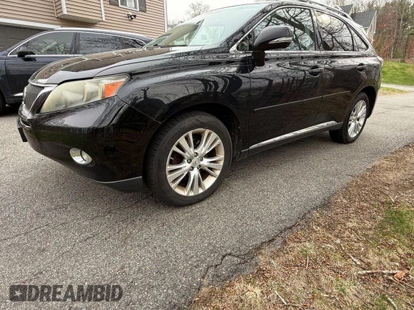 2010 Lexus RX 450h with VIN JTJBC1BA2A2412709, listed as a Copart auction lot 54962565 with 240,611 mi miles and Clean Title. Bid and sale history available at DreamBid. Image 2.