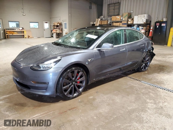 2020 Tesla Model 3 Performance z VIN 5YJ3E1EC8LF640891, wystawiony jako Copart lot #52377615 z przebiegiem 77 343 mil mil oraz Szkoda całkowita • Salvage title. Historia ofert i sprzedaży dostępna na DreamBid. Obrazek 1.