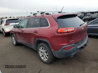 2014 Jeep Cherokee Altitude with VIN 1C4PJMCSXEW124863, listed as a Copart auction lot 82432534 with 194,559 mi miles and Salvage Title. Bid and sale history available at carsss.com. Image 2.